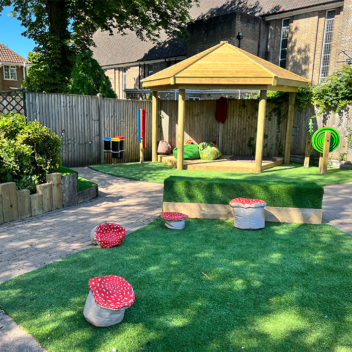 an outdoor classroom with beanbags